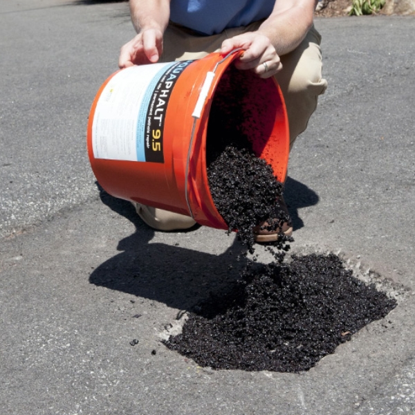 Pour Aquaphalt into the repair area